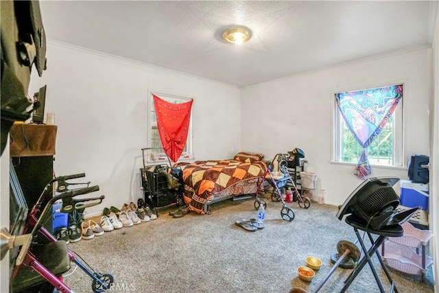 carpeted bedroom featuring ornamental molding