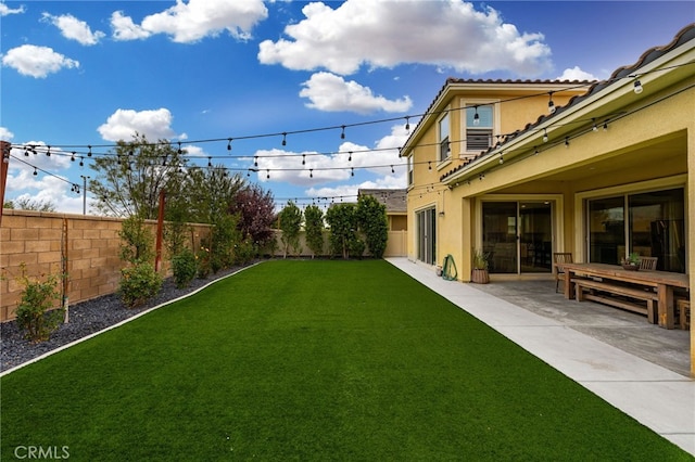 view of yard with a patio