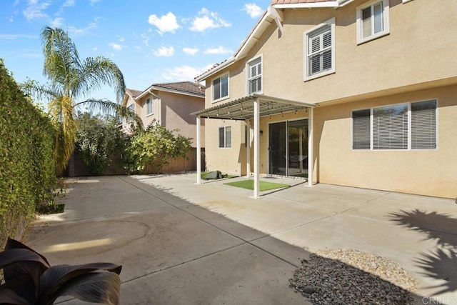 rear view of property with a patio