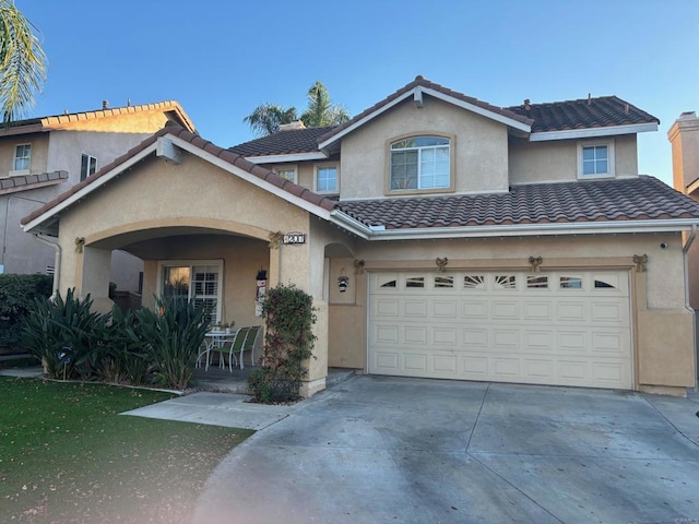 view of front of property featuring a garage