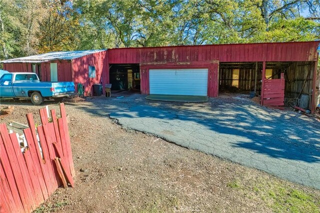 view of front of home with an outdoor structure