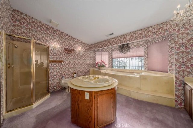 bathroom with wallpapered walls, vanity, visible vents, and a stall shower