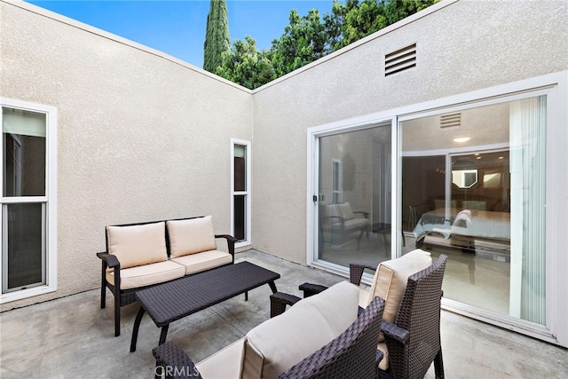 view of patio with an outdoor hangout area