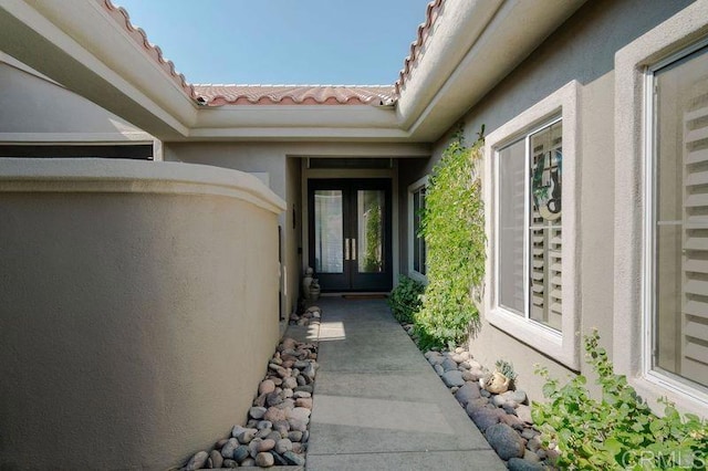 view of exterior entry with french doors