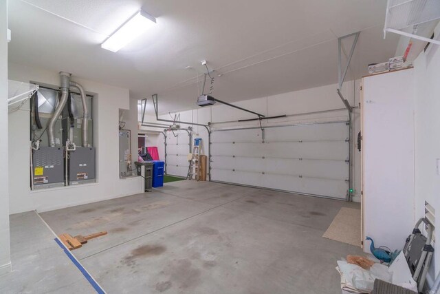 garage with heating unit and a garage door opener