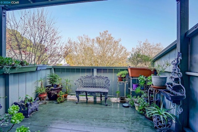 wooden balcony featuring a wooden deck