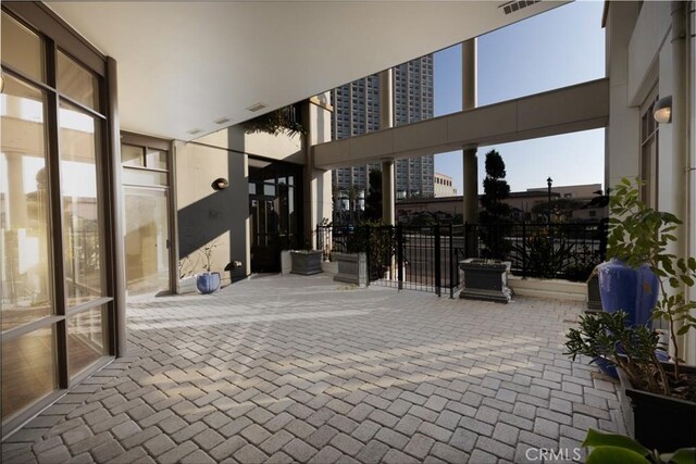 700 W Harbor Dr Unit 104, San Diego, CA 92101 - view of patio / terrace with fence