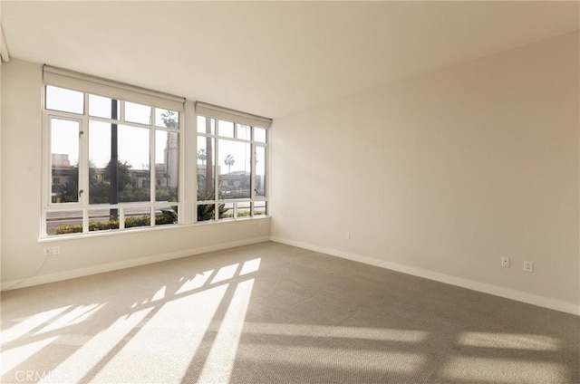 700 W Harbor Dr Unit 104, San Diego, CA 92101 - carpeted empty room with healthy amount of natural light