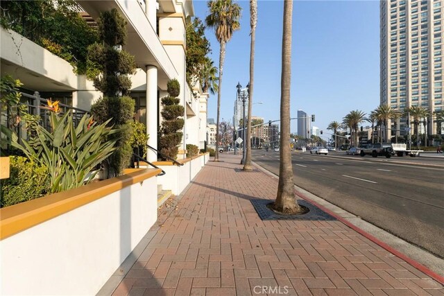 700 W Harbor Dr Unit 104, San Diego, CA 92101 - view of asphalt road featuring sidewalks, street lighting, and curbs