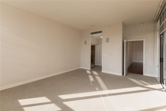 700 W Harbor Dr Unit 104, San Diego, CA 92101 - unfurnished bedroom featuring light colored carpet and baseboards