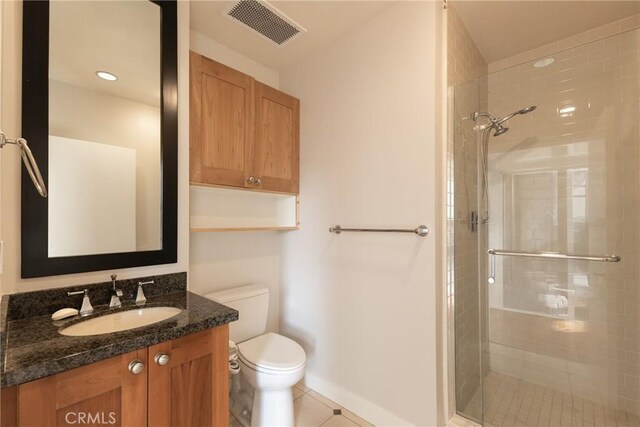 700 W Harbor Dr Unit 104, San Diego, CA 92101 - full bathroom featuring vanity, a shower stall, and tile patterned floors