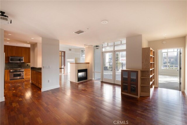 living room with dark hardwood / wood-style floors