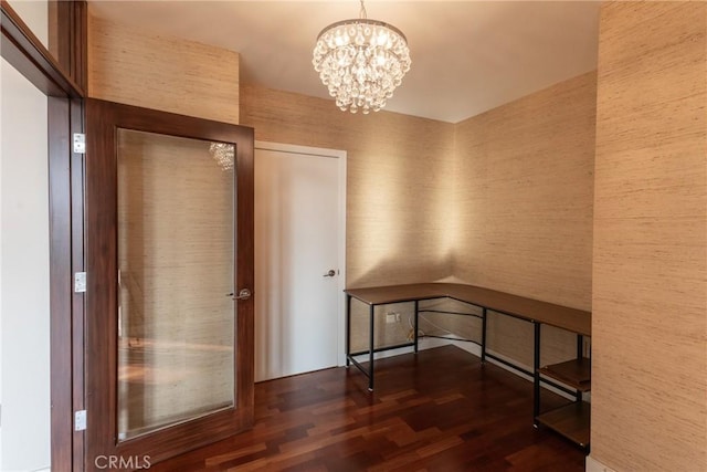 700 W Harbor Dr Unit 104, San Diego, CA 92101 - hallway with wood finished floors and a chandelier