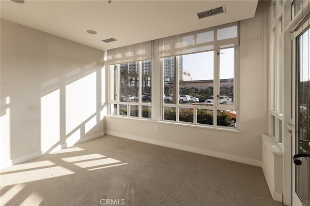 700 W Harbor Dr Unit 104, San Diego, CA 92101 - unfurnished sunroom featuring carpet floors