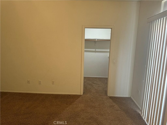 empty room with carpet flooring