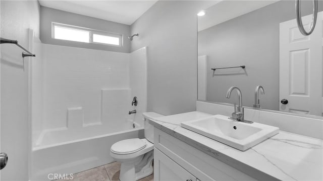 full bathroom featuring tile patterned flooring, vanity, toilet, and shower / bath combination