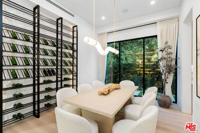 dining room with light wood-type flooring