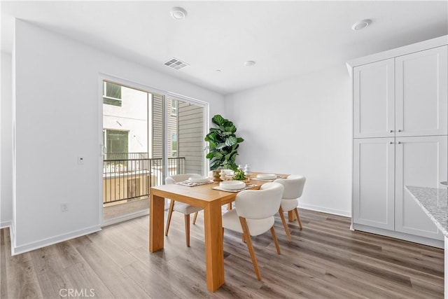 dining area featuring light hardwood / wood-style flooring