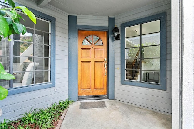 doorway to property featuring a porch