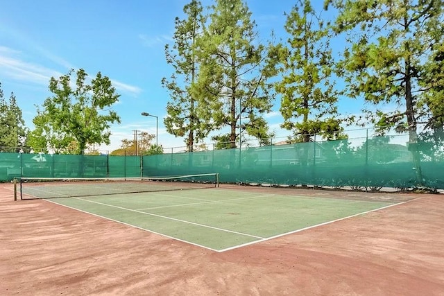 view of tennis court with basketball court