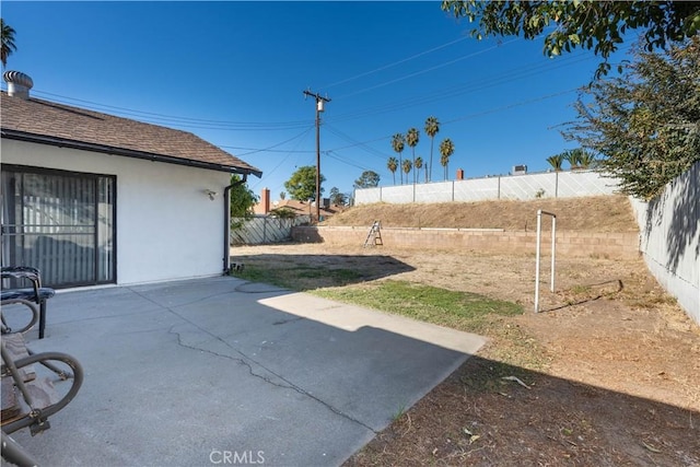 view of yard with a patio area