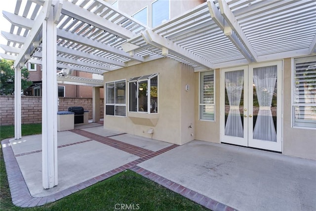 view of patio / terrace featuring a pergola and area for grilling