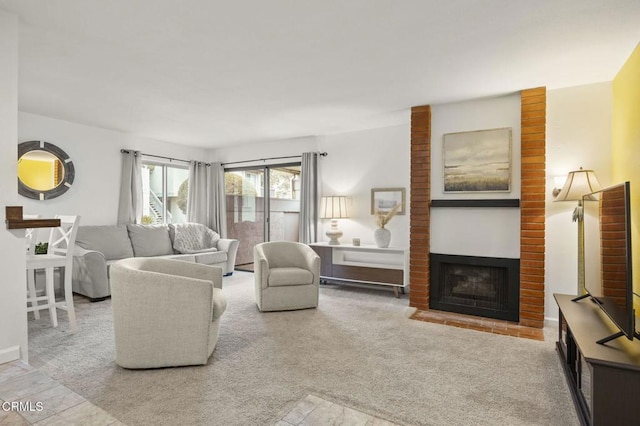 carpeted living room with a fireplace