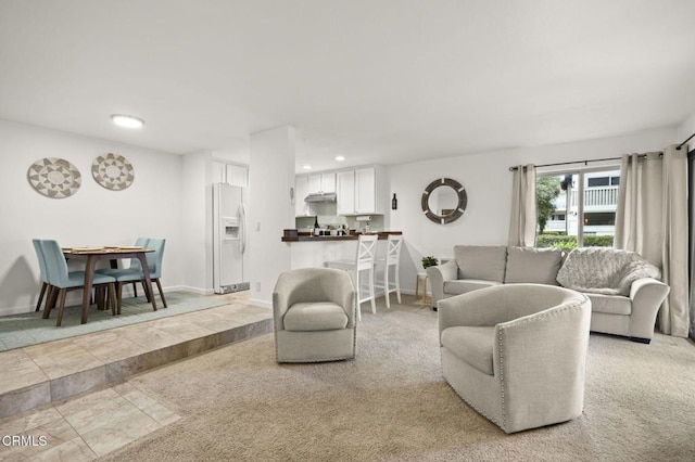 living room featuring light colored carpet