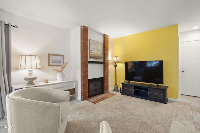 living room featuring a fireplace and light carpet