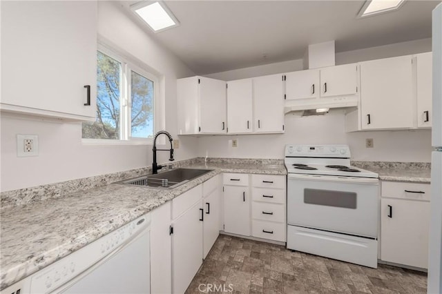 kitchen featuring white appliances, white cabinetry, and sink