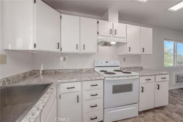 kitchen featuring white cabinets, white electric range, and sink