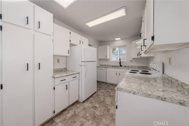 kitchen featuring sink, white cabinets, and white appliances