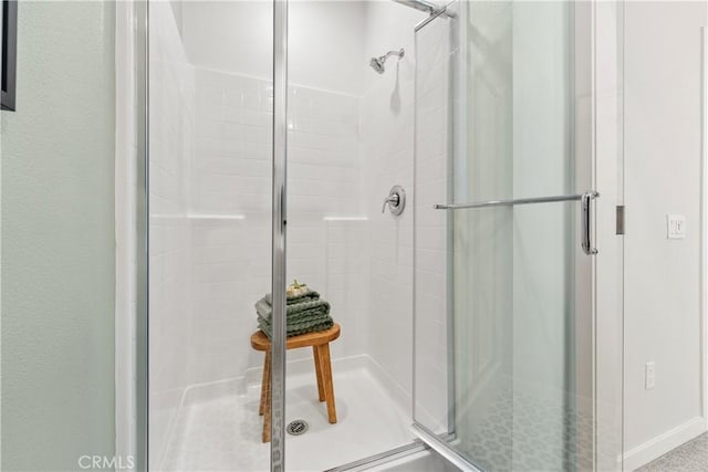 bathroom featuring an enclosed shower