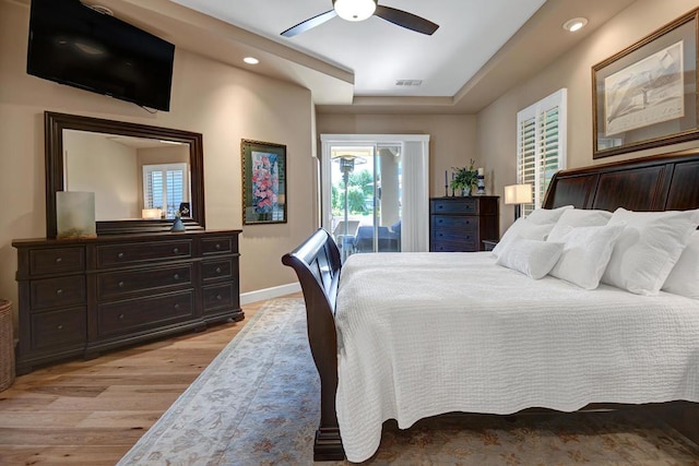 bedroom featuring light wood-type flooring and ceiling fan