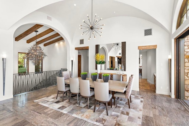 dining room featuring beamed ceiling, an inviting chandelier, and high vaulted ceiling