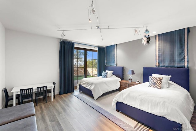 bedroom featuring hardwood / wood-style floors