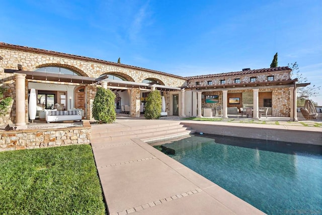 back of house with a patio area