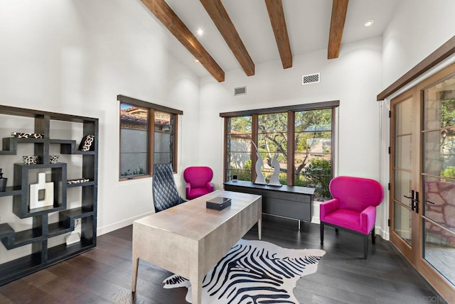 office featuring french doors, beamed ceiling, dark wood-type flooring, and a high ceiling