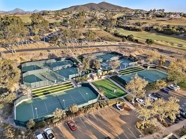 birds eye view of property with a mountain view