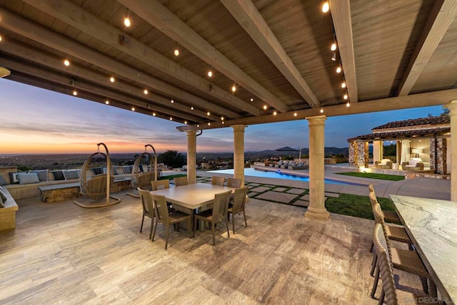 view of patio terrace at dusk