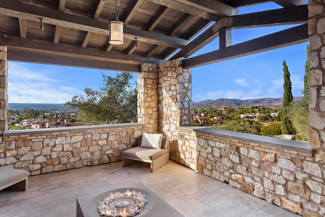 view of patio featuring a mountain view