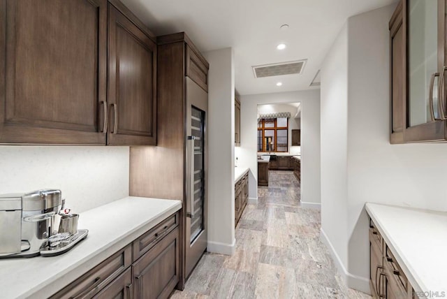 kitchen with dark brown cabinets