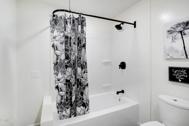 bathroom featuring toilet and shower / tub combo with curtain