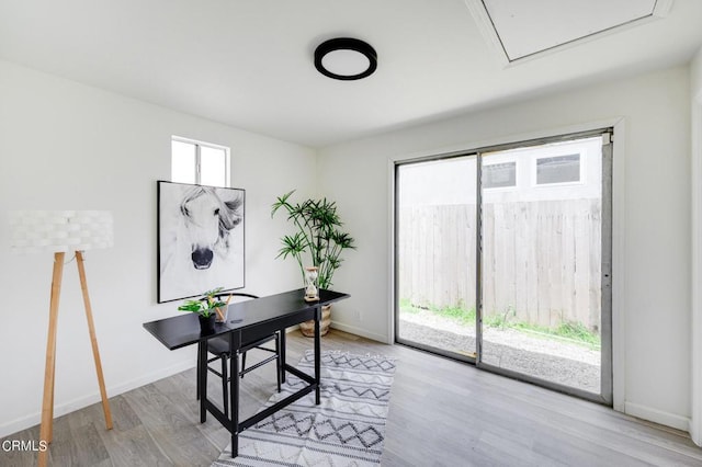 office space with light hardwood / wood-style floors