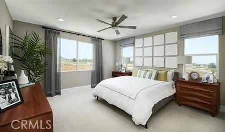 bedroom featuring carpet flooring and ceiling fan