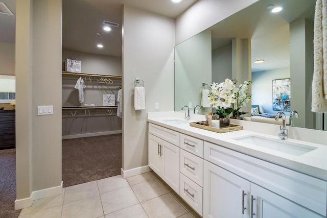 bathroom with vanity and tile patterned floors