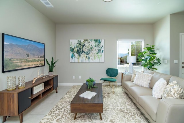 living room featuring light tile patterned flooring