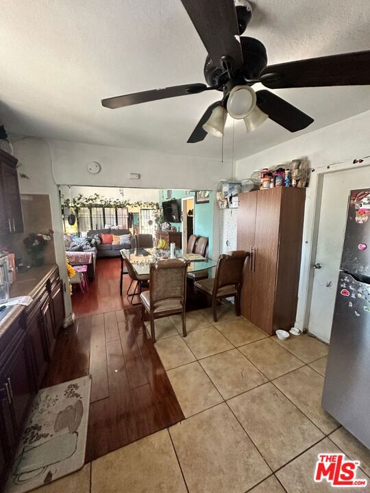 dining room featuring ceiling fan and light hardwood / wood-style flooring