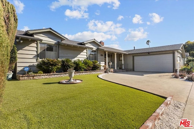 ranch-style home featuring a front yard and a garage