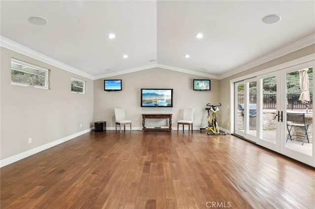 unfurnished room featuring hardwood / wood-style floors, ornamental molding, and french doors